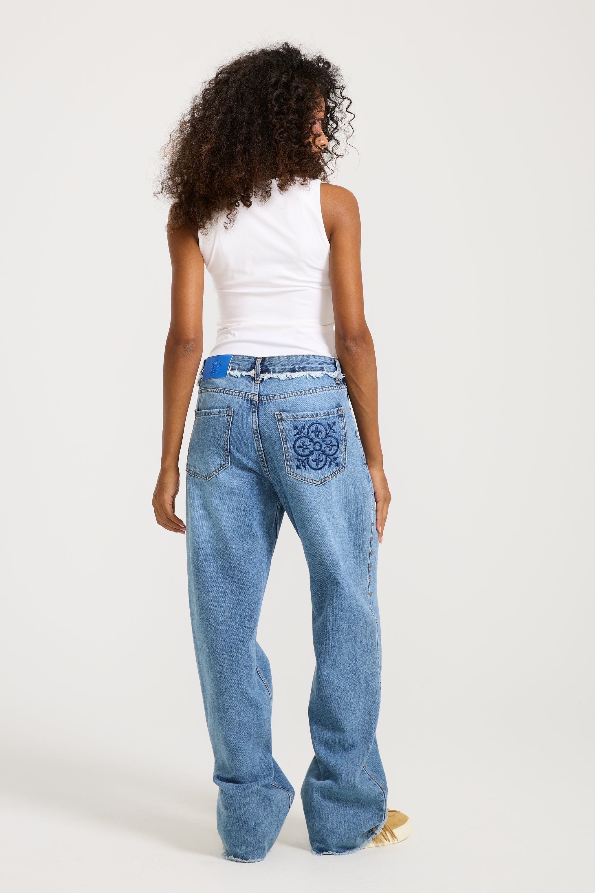 Unfinished studded Denim Mid Wash