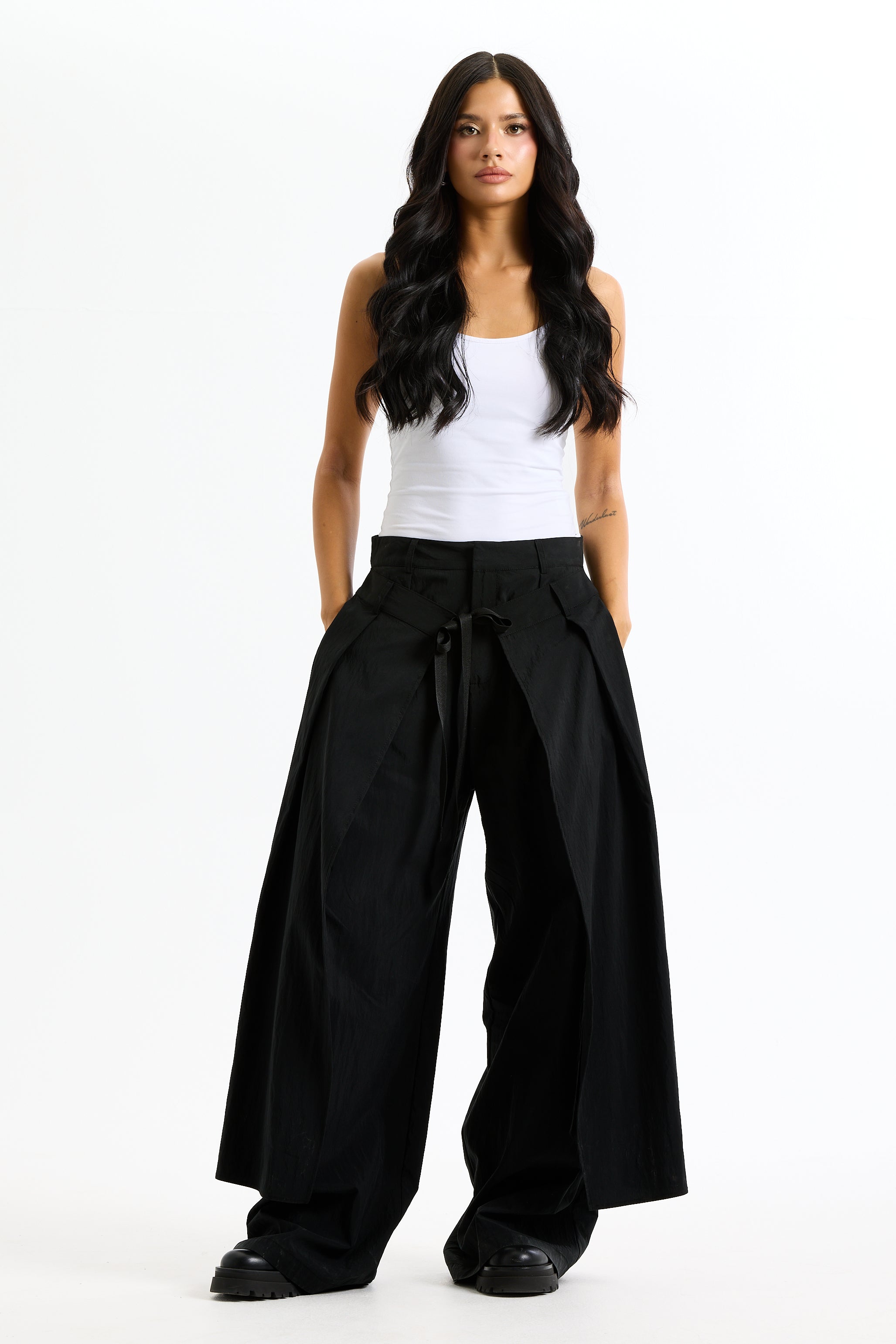 Extra Fabric Front Pants In Black