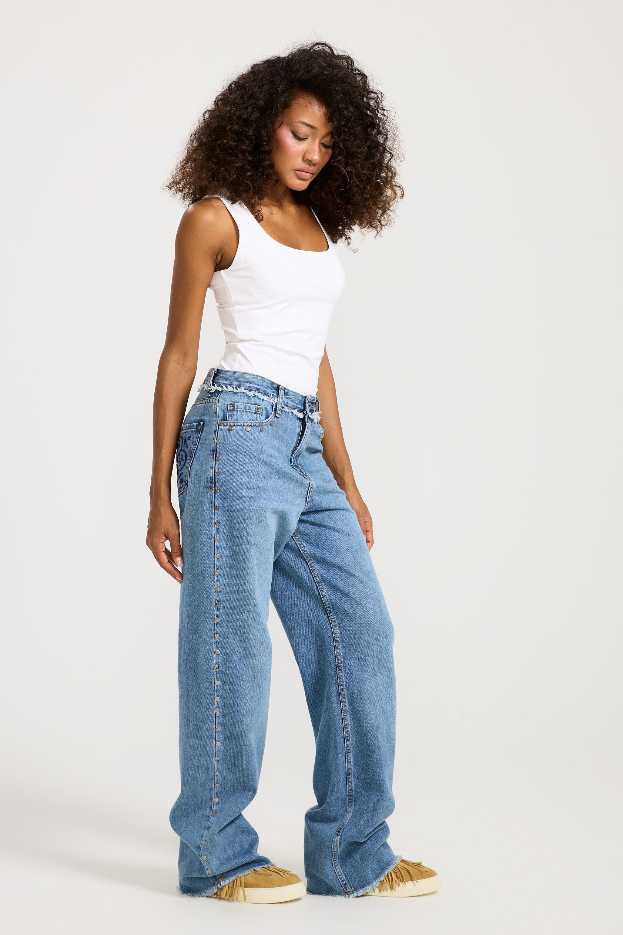 Unfinished studded Denim Mid Wash